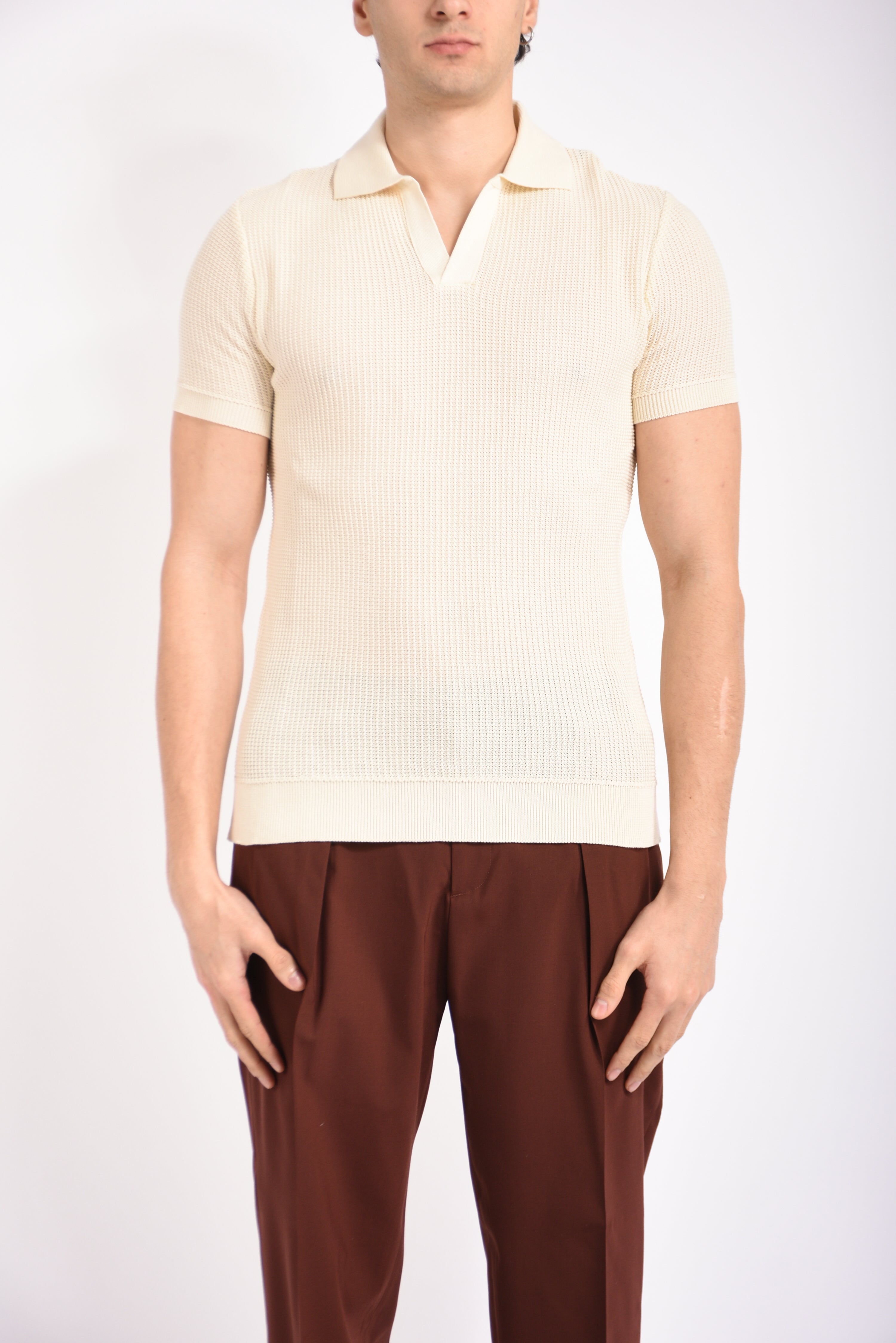 Polo traforata in cotone