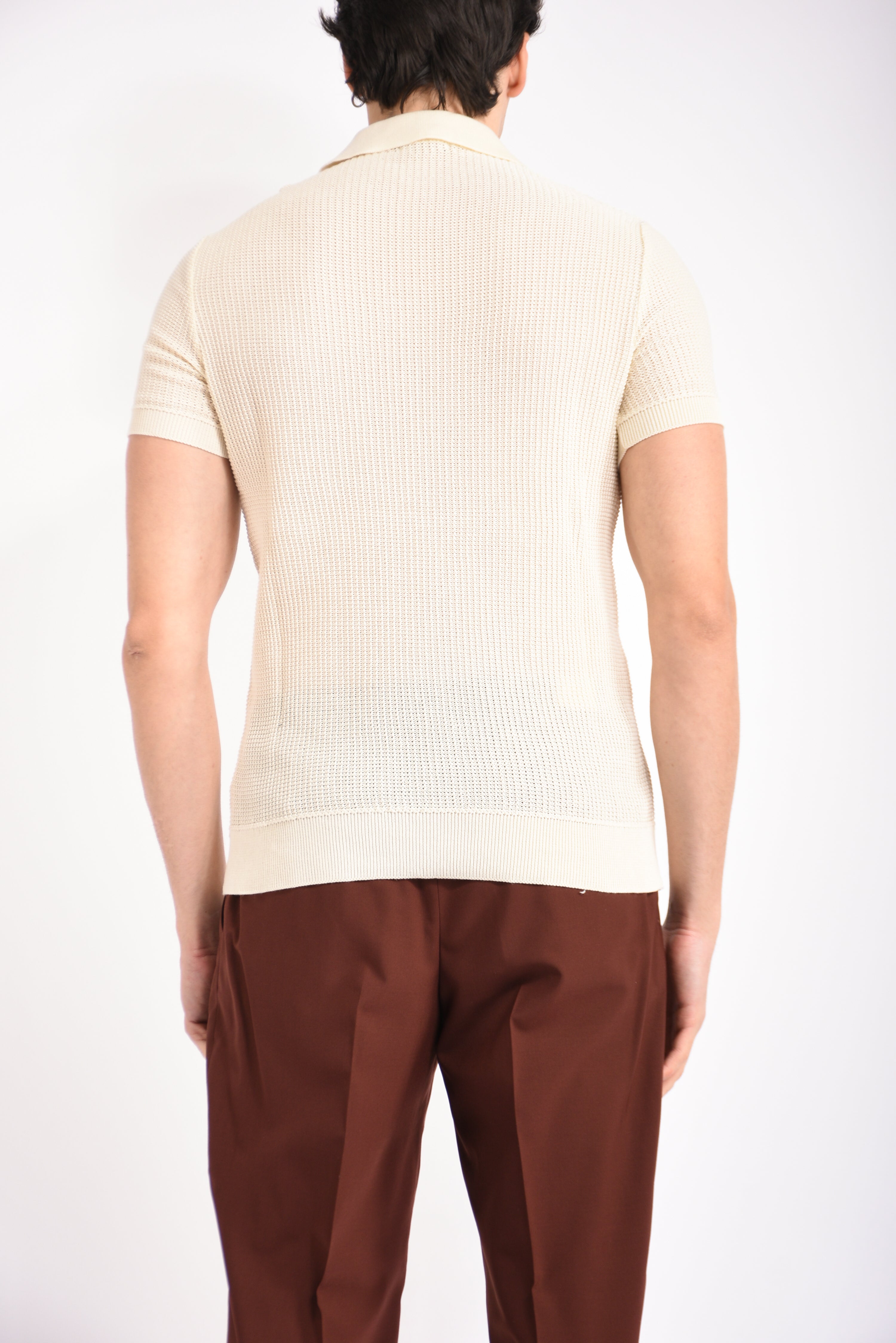 Polo traforata in cotone