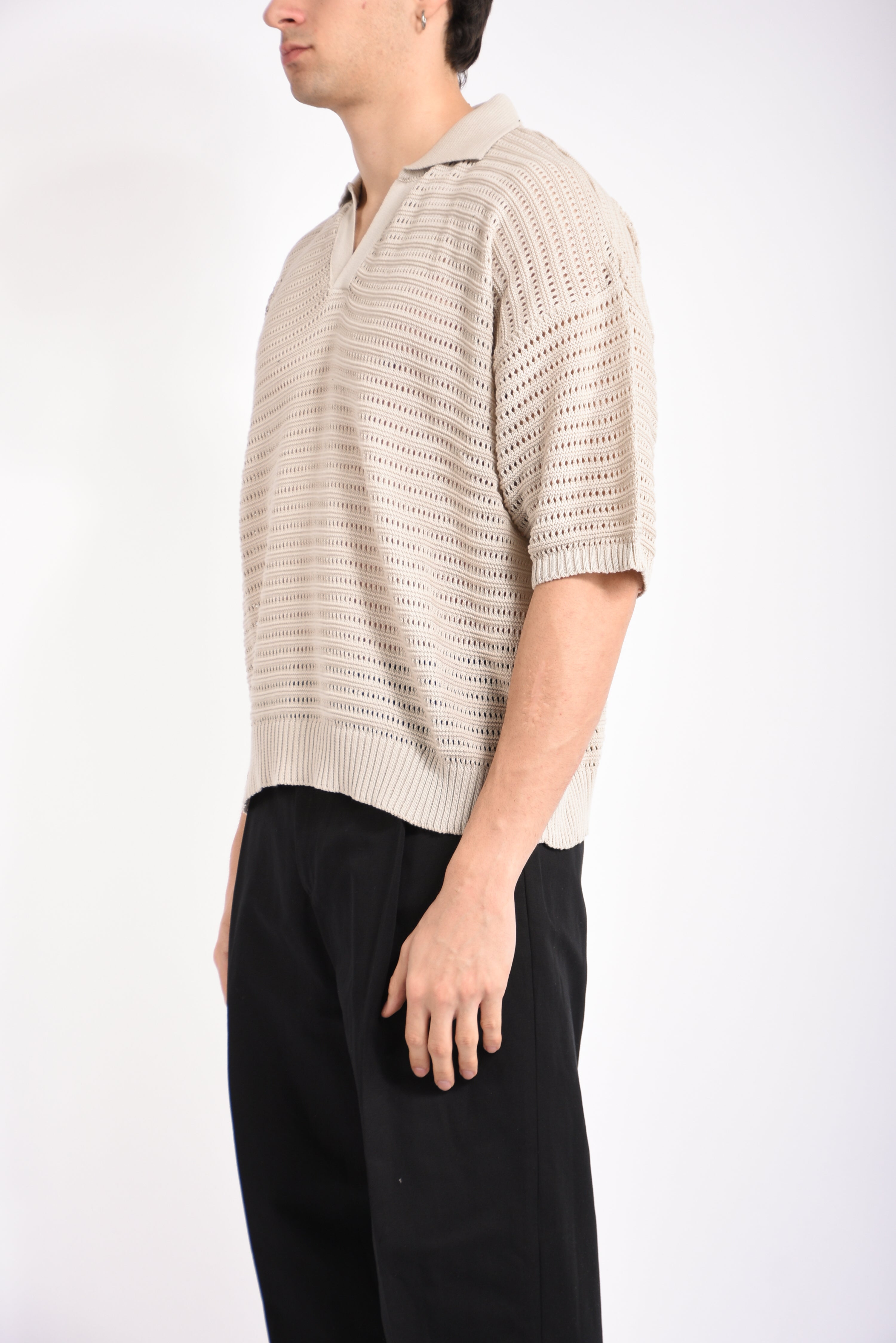 Polo traforata in cotone