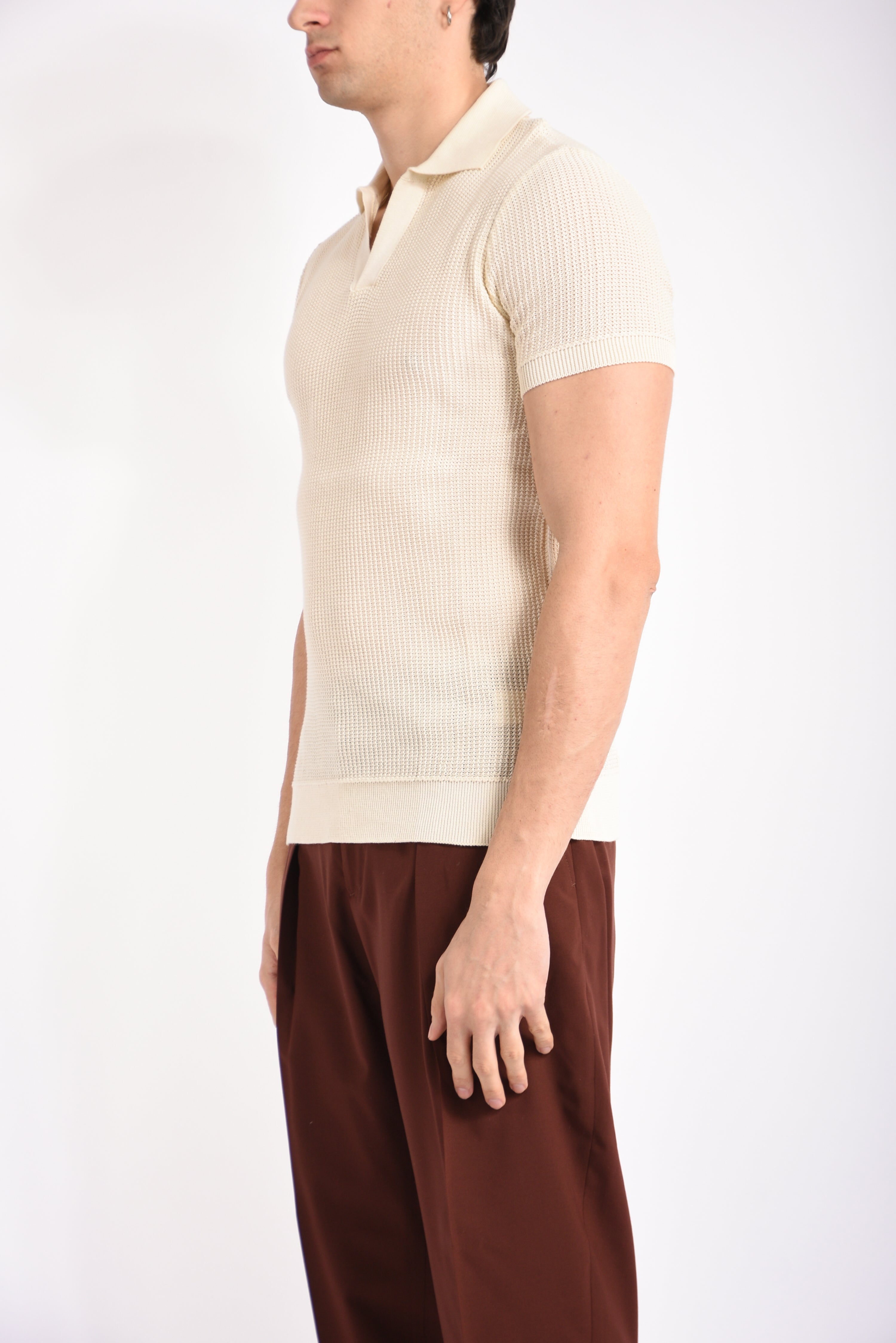 Polo traforata in cotone