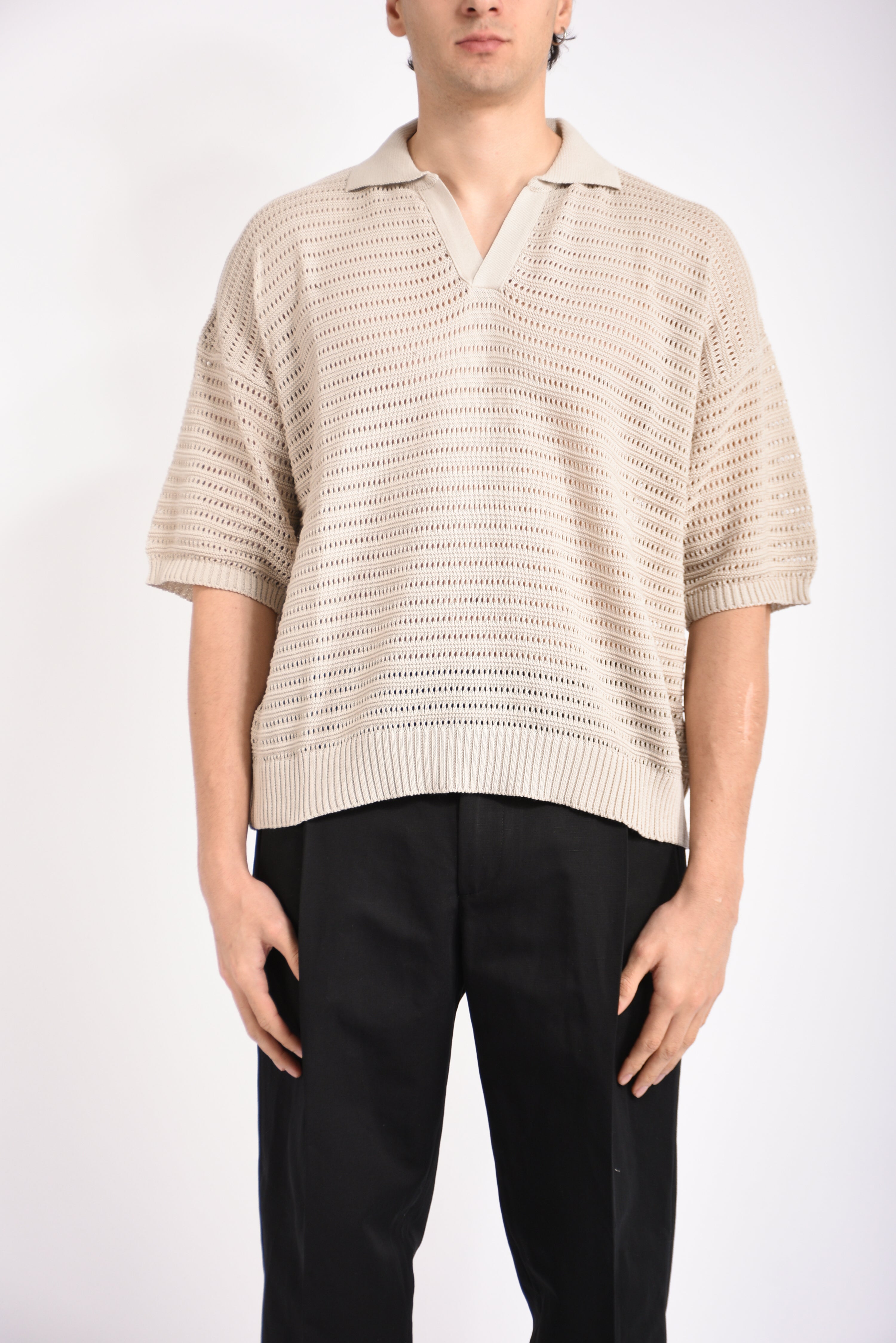 Polo traforata in cotone