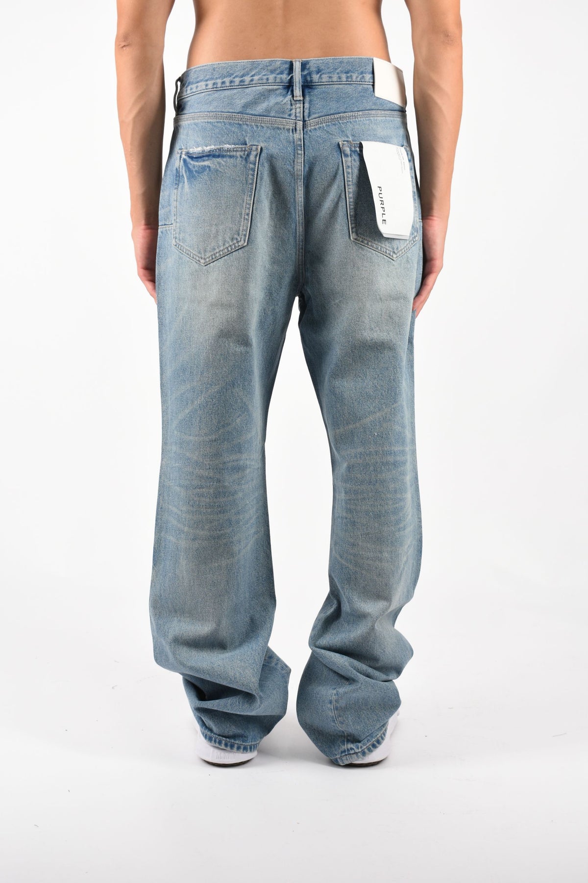 Jeans bootcut rip and repair